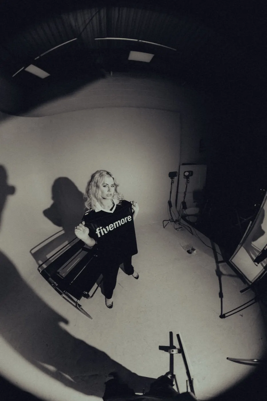 Behind the frame, on set with the jersey